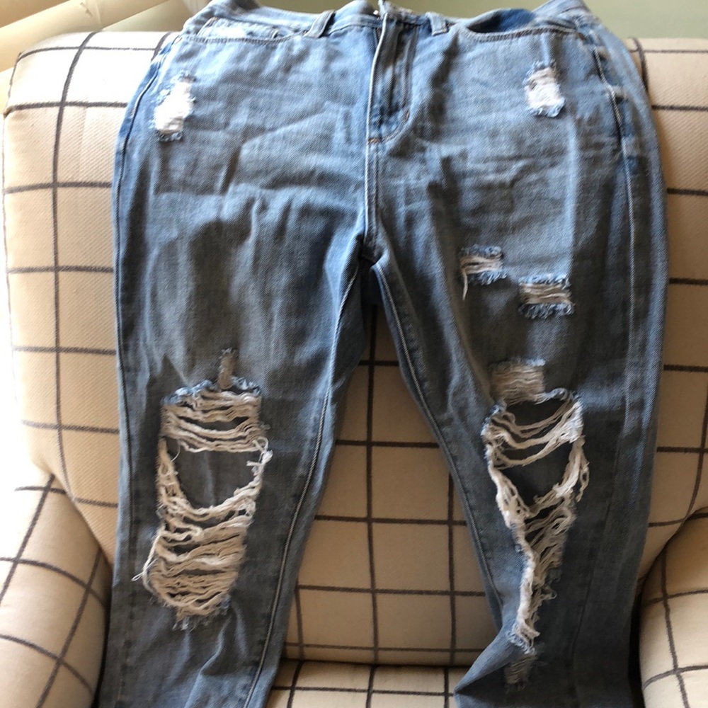 Heavily distressed lightwash jeans